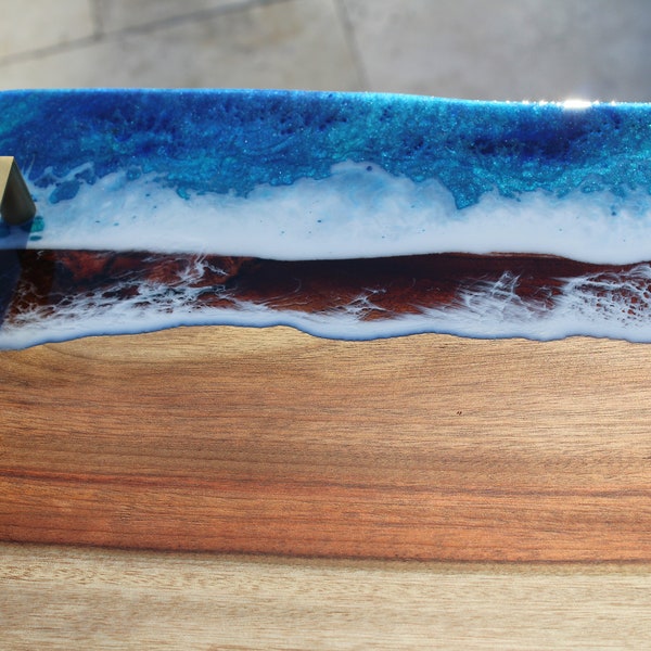 Ocean Resin Art long serving tray with gold handles.