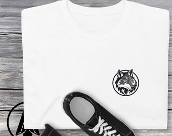 May include: White t-shirt with a black and gray wolf head graphic in a circle on the left chest.