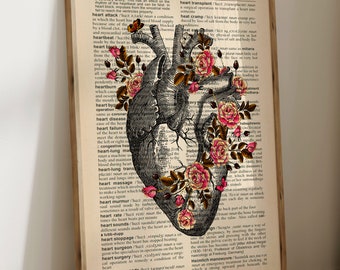 May include: A vintage anatomical illustration of a human heart with delicate pink and red roses blooming around it. The image is printed on a page from a medical dictionary with the word "heart" highlighted.