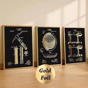 May include: Three framed wall art prints featuring gold foil patent illustrations on black backgrounds. The prints display technical drawings of a mining pick, a gold washing pan, and a balance scale, each with detailed labels and patent dates.
