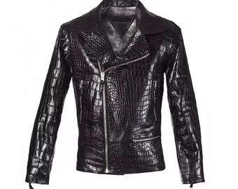 May include: A black leather biker jacket with a zip fastening and a crocodile skin pattern.
