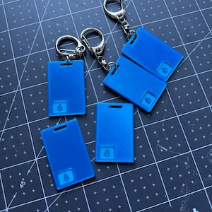 Insigne porte-clé Lumon pour carte-clé d'indemnité de départ | Cadeau pour fan de série TV | Merch de porte-clés de science-fiction | Imprimé en 3D