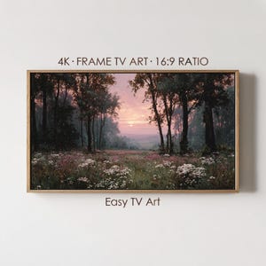 Puede incluir: Pintura de paisaje enmarcada de un bosque al atardecer. La obra presenta árboles altos, un campo de flores silvestres y un cielo suave rosa y naranja. El texto en el marco dice "4K FRAME TV ART 16:9 RATIO" y "Easy TV Art."