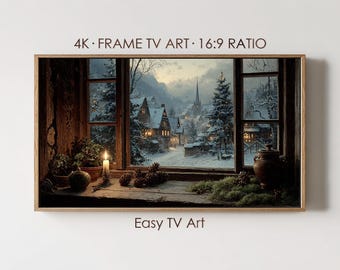 Puede incluir: Una impresión artística digital enmarcada para un televisor 4K, que representa una escena de un pueblo invernal vista a través de una ventana. La obra de arte presenta un interior cálido con una vela encendida y un exterior nevado con casas e iglesia. El texto en la imagen dice "4K • FRAME TV ART • 16:9 RATIO" y "Easy TV Art."