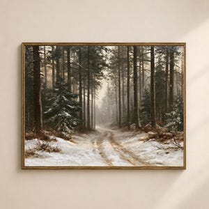 May include: A rectangular framed wall art print depicting a winter forest scene with tall pine trees, a snow-covered path winding through the center, and light snowfall. The color palette features deep browns, dark greens, and muted white tones.