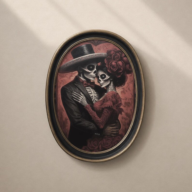 May include: An oval framed print shows a skeletal couple in an embrace. The male figure wears a black suit, top hat, and bow tie. The female figure is in a red dress and floral headpiece. The background is a textured red.