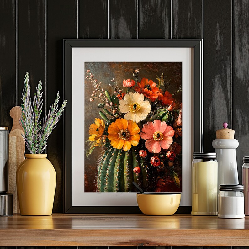 May include: A framed print of a still life featuring a cactus with a bouquet of colorful flowers, including yellow, orange, pink, and red blooms. The flowers are arranged in a vase and the cactus is in the background.