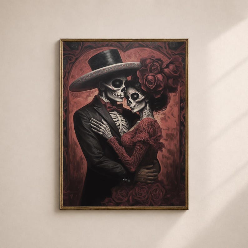 May include: A framed print showing a skeletal couple in an embrace, dressed in formal wear. The man is in a black suit and a wide-brimmed hat, the woman in a red dress and roses. The artwork has a dark, romantic theme, with a red background.
