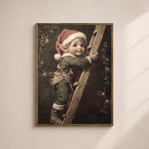 May include: A framed vintage print depicts a smiling elf in a red Santa hat and green outfit climbing a wooden ladder. The elf has pointed ears and is surrounded by twinkling lights, evoking a festive holiday theme.