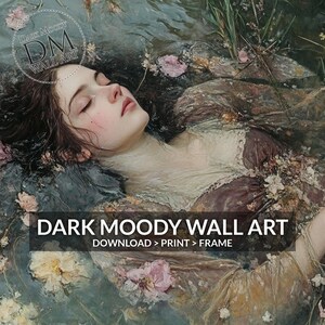 May include: A digital art print featuring a woman floating in water, surrounded by flowers. The artwork has a dark, moody aesthetic with a vintage feel. The text "DARK MOODY WALL ART" is displayed at the bottom.