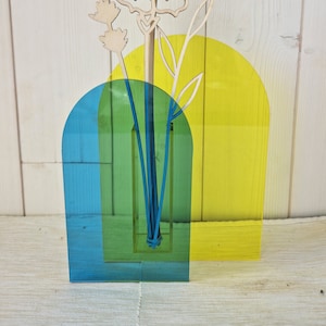 Small acrylic vase for wooden or dried flowers