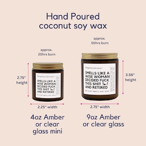 May include: Two amber glass candles with gold lids. The smaller candle is 2.75 inches tall and 2.25 inches wide, while the larger candle is 3.56 inches tall and 2.75 inches wide. Both candles have text that reads "Smells like a wise woman decided fuck this shit and retired."