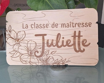 Door sign "The teacher's class..."