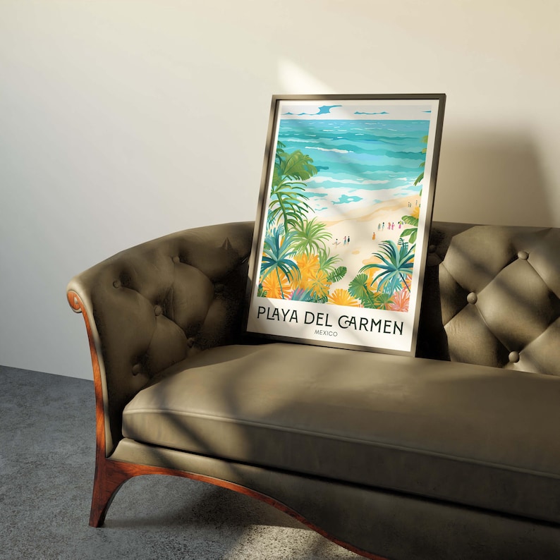 May include: A framed poster featuring a colourful illustration of a beach scene with palm trees and turquoise water. The text "PLAYA DEL CARMEN MEXICO" is printed at the bottom of the poster.