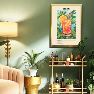 May include: A gold bar cart with two shelves, a glass of Mai Tai, and a framed print with the text "MAI TAI" and a recipe for the cocktail. The cart is decorated with leather straps and has a green plant on the top shelf. The print is set against a green wall.