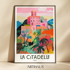 May include: A colorful illustration of La Citadelle, a fortress in Haiti, with a pink building and lush green foliage. The text "LA CITADELLE" and "HAITI" is printed below the illustration.