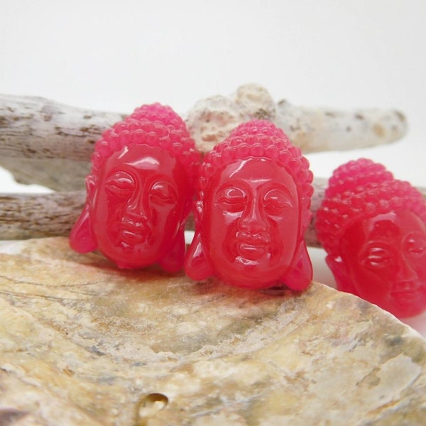 2 perles tête Bouddha fuchsia en corail de synthèse 2 dimensions