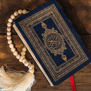 Święty Koran: Tekst arabski z tłumaczeniem na angielski