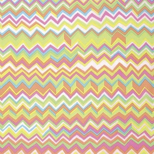 May include: Abstract pattern with a chevron design in shades of pink, orange, yellow, green, and blue.