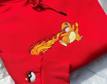 Sweat à capuche brodé Pokemon Salamèche ; Sweat brodé Pokémon ; Broderie Pokémon ; Sweats à capuche Pokémon ; Sweat Pokémon Dragonite