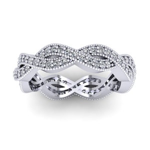 May include: A silver band ring with a delicate, interwoven design accented with small, sparkling diamonds.