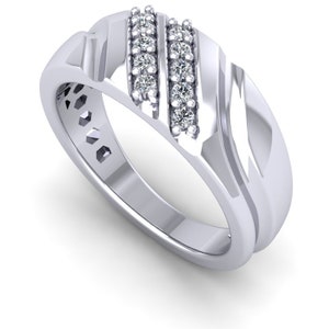 May include: A silver band with two rows of small diamonds set into the band.