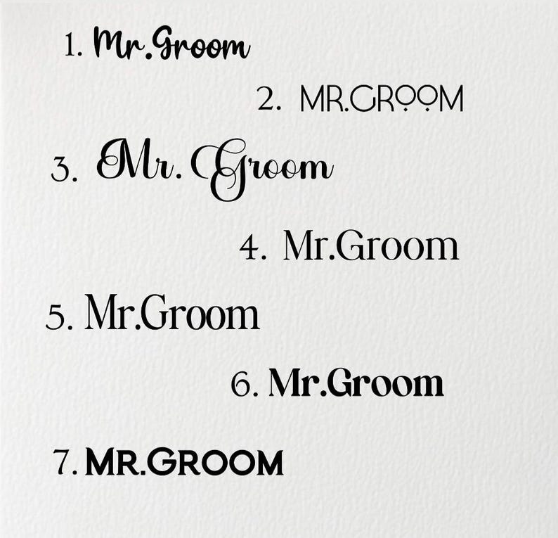 May include: A white background with the text "Mr. Groom" in seven different fonts and styles. The text is in black and is numbered from 1 to 7. The text is a wedding theme.