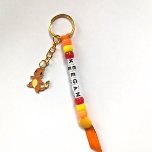 Personalised Pocket Monster keyring/keychain, perfect for birthdays gifts, presents, stocking fillers, treats, favours, gifts,