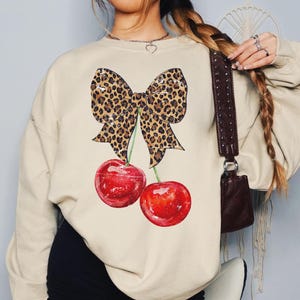 Coquette Bows Sweatshirt, Coquette Sweatshirt, Ribbon Sweatshirt, Cherry Bow Shirt, Soft Girl Shirt, Aesthetic Shirts Bow Shirt Leopard Bow