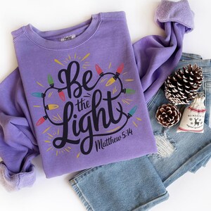 Comfort Colors® Be The Light Sweatshirt, Religious Christmas Sweatshirt, Christian Holiday Sweater, Faith Based Gift, Christmas Gifted