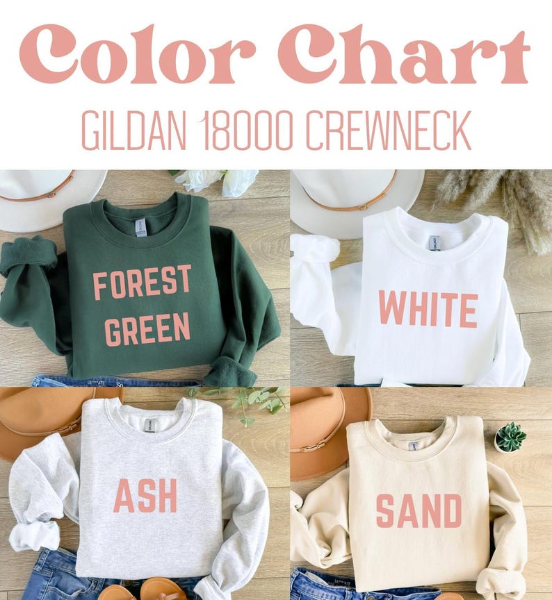May include: A color chart featuring four Gildan 18000 crewneck sweatshirts. The sweatshirts are forest green, white, ash, and sand. Each sweatshirt displays its color name in a pink font. The image includes hats and jeans.