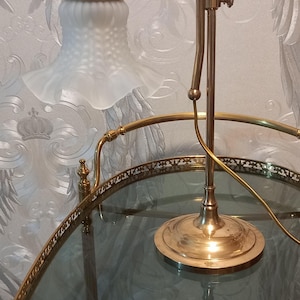 Old Art Nouveau lamp made of brass and a tulip made of frosted glass