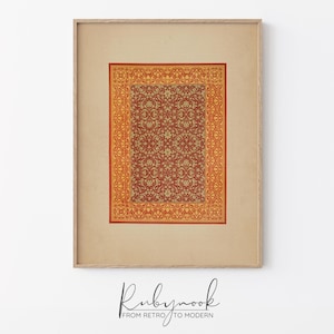 May include: A framed print of a vintage rug with a red background and a yellow and white floral pattern.