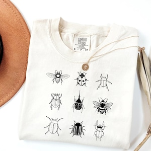 May include: A rustic wooden sign with the text "Welcome to our home" in white lettering. The sign features a distressed finish and a simple, inviting design, perfect for a front porch or entryway.