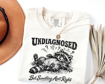 Undiagnosed But Something Ain't Right Shirt - Funny Neurospicy Raccoon Tee