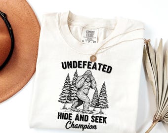 Undefeated Hide and Seek Champion Shirt - Funny Bigfoot Graphic Tee