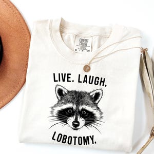 Funny Raccoon Comfort Colors Shirt: Live Laugh Lobotomy Tee