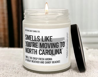 Smells like you're moving to north carolina scented soy candle, 9oz, white label