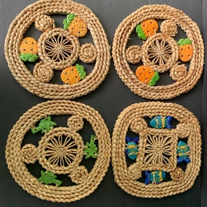 Four Woven Straw Rattan Trivets/Pads/Mats with Ceramic Fish, Trees, and Pineapples - Approximately 9 x 5/8”