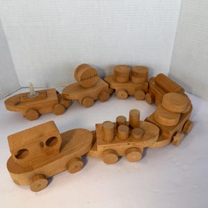 Collectible Vintage Handcrafted Wooden Toy Push Train Engine and 6 Cars by Charles & June Miller