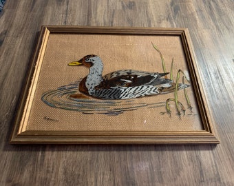 Vintage Framed Reverse Glass Painting of a Duck on Pond with Burlap Background