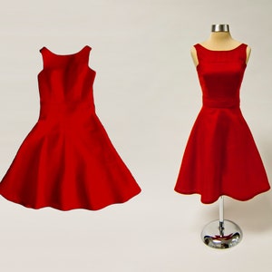 May include: A sleeveless red dress with a scoop neck and a flared skirt.