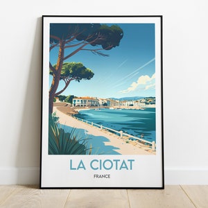 May include: A colorful illustration of a coastal town in La Ciotat, France. The image features a blue bay with a white boardwalk, a pine tree, and buildings in the distance. The text "LA CIOTAT" and "FRANCE" is printed below the image.