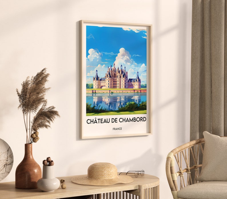 May include: A vintage travel poster featuring a colorful illustration of Ch&acirc;teau de Chambord, a grand French castle with a moat and reflecting water. The text on the poster reads "Ch&acirc;teau de Chambord, France".
