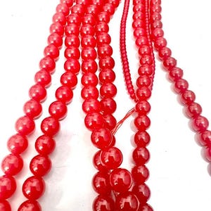 Ruby Corundum smooth round beads size 6 mm 7 mm 8 mm 9 mm, 8 inch strand.