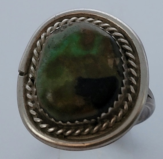 Silver Ring with Turquoise Stone Center - image 1