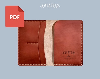 Puede incluir: Una cartera de cuero marrón con costuras blancas y la palabra "AVIATOR" impresa en la parte delantera. La cartera tiene un icono PDF en la esquina superior izquierda. También es visible el texto "Hand made & authentic".