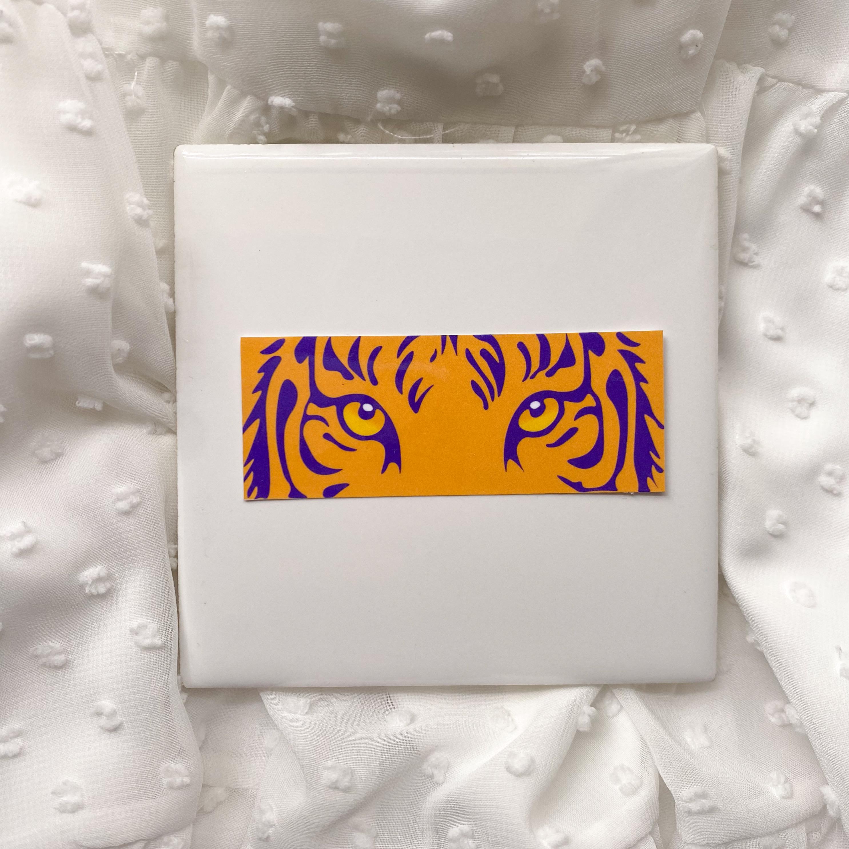 thumbnail image 2 of LSU Tigers Large Eye Fleur De Lis Cornhole Decals – Set Of 2 – 11" X 11.5" – Officially Licensed 2 of 4