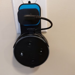 Wall mount display for Echo Dot - Alexa generation three -3 devices. Hide chords and open up counter or table space. Looks organized.