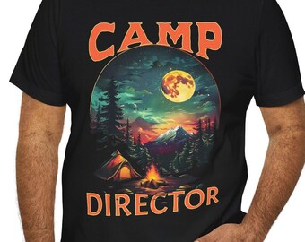 May include: A black t-shirt with a graphic of a campfire scene with a full moon and the text "CAMP DIRECTOR" in orange.